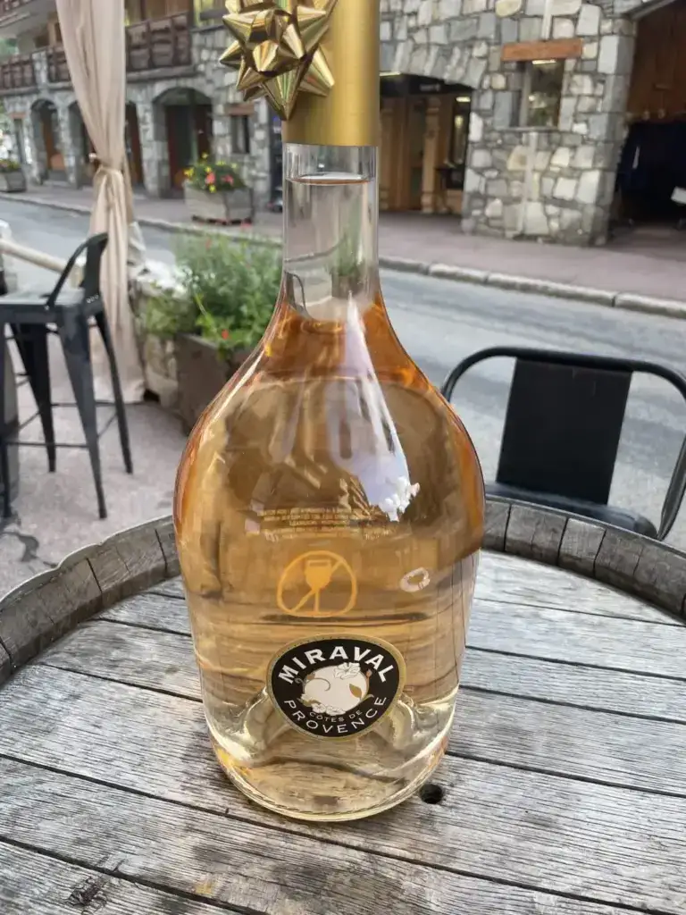 Bottle of Miraval rosé wine enjoyed during après-ski in Méribel near La Petite Cachée chalet in the Three Valleys, France.